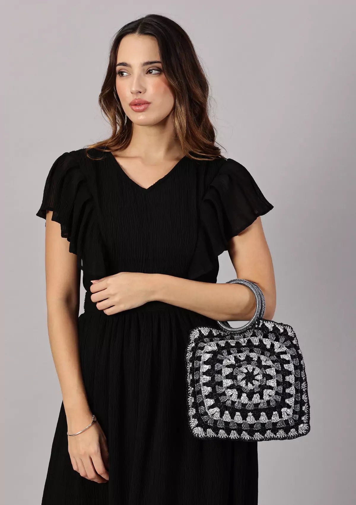 Buy Black shimmering crochet handheld bag