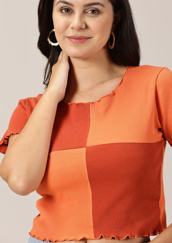 Close up of model wearing Red & Orange Colour Ribbed Crop Top