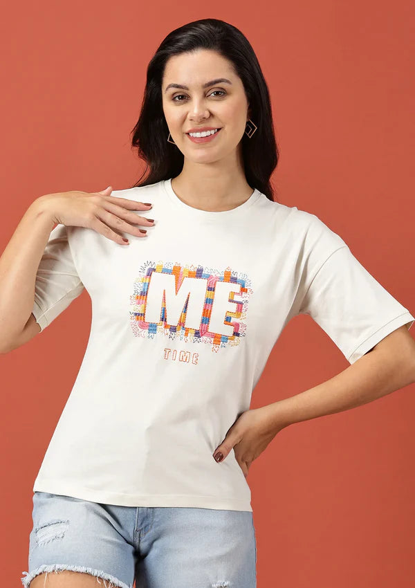 Model wearing Off-White Drop Shoulder Oversized Top with 'MEtime' embroidery over Denim shorts