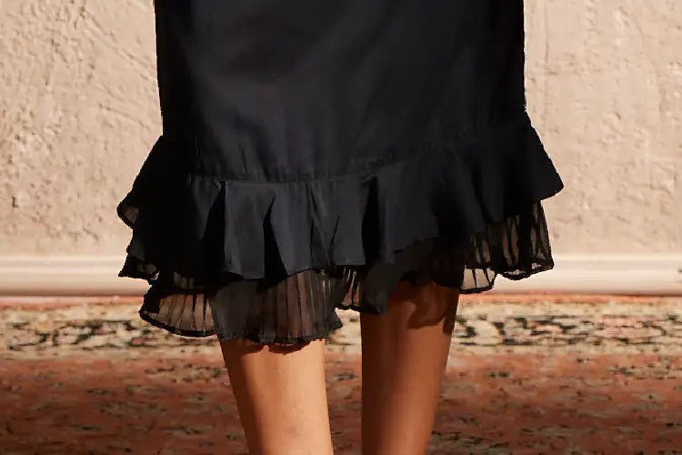 Zaynab - Black pleated hem trumpet skirt - IshqME