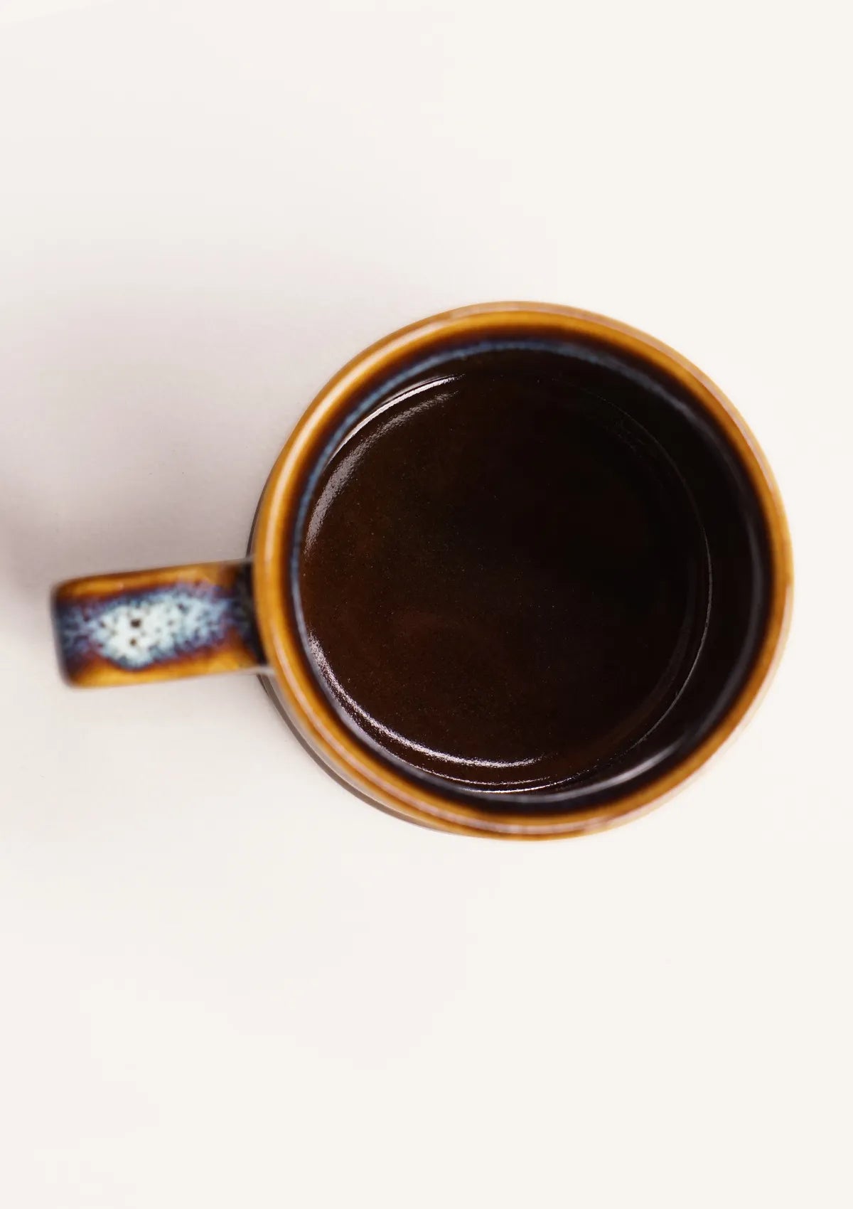 Ceramic drinking mug in Blue Brown