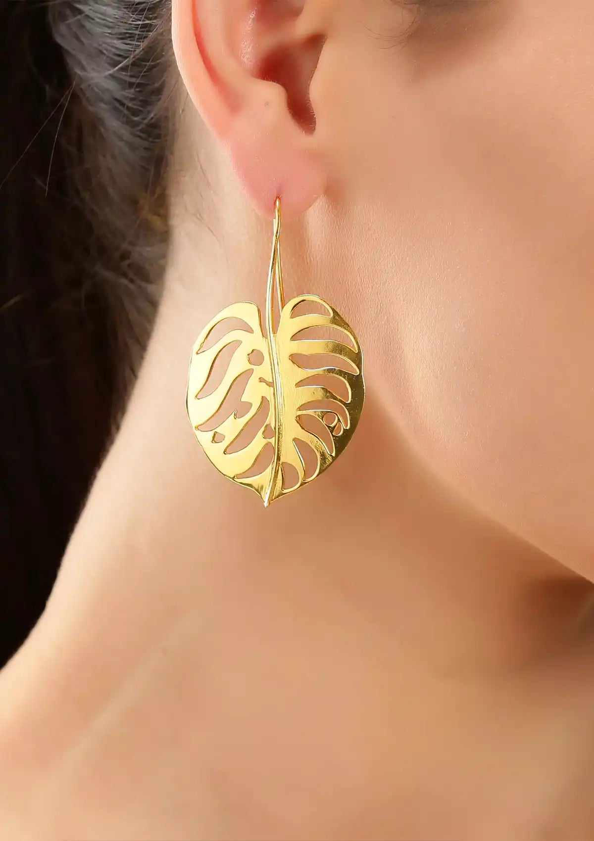 Designer gold finish leaf earrings for women