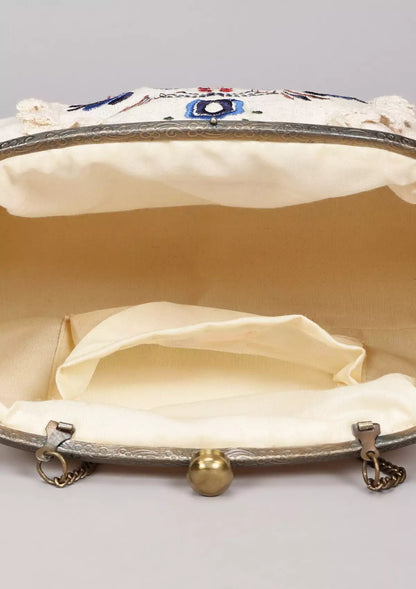 Beige handheld clutch and sling bag Price