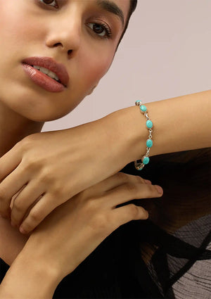 Silver Bracelet studded with Turquoise Gemstones