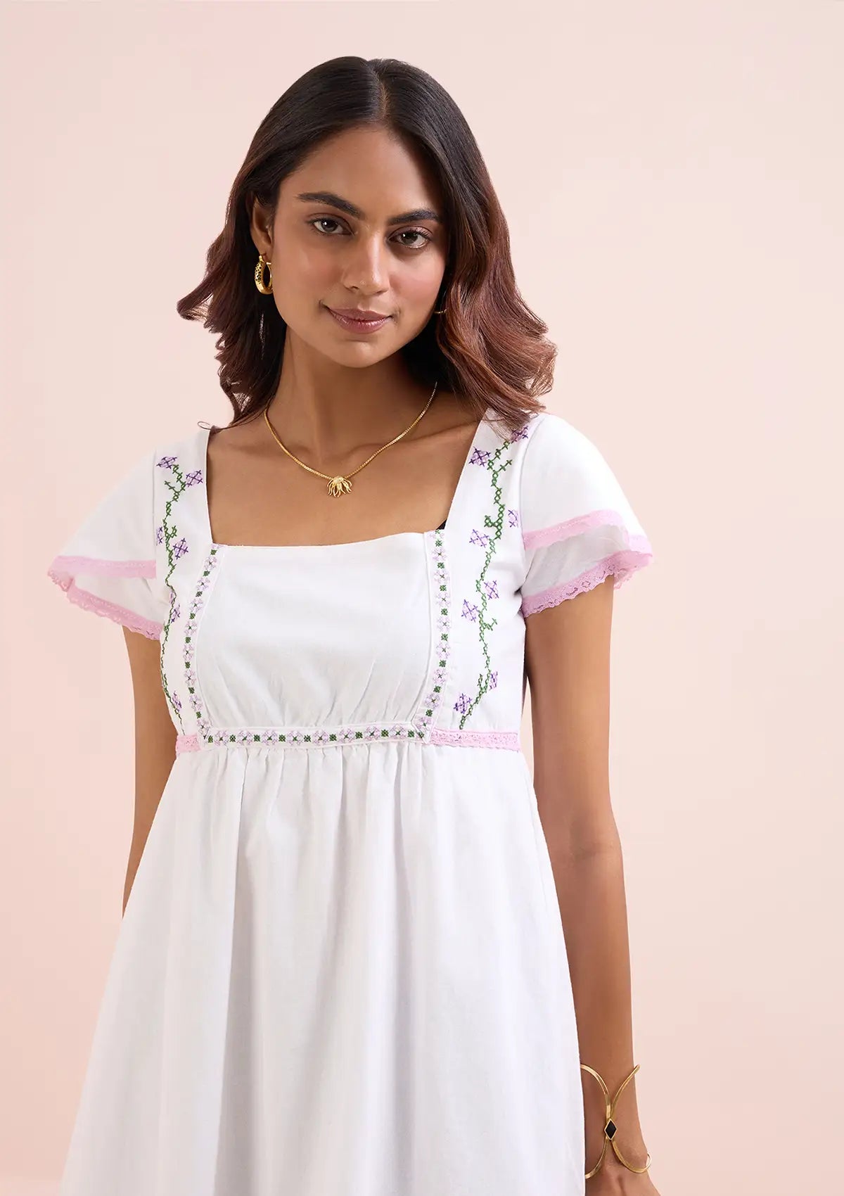 Buy Snow White Petal Sleeve Empire Dress online for women at IshqME