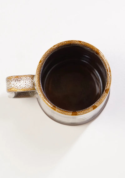 Cream & brown ceramic mug for beer