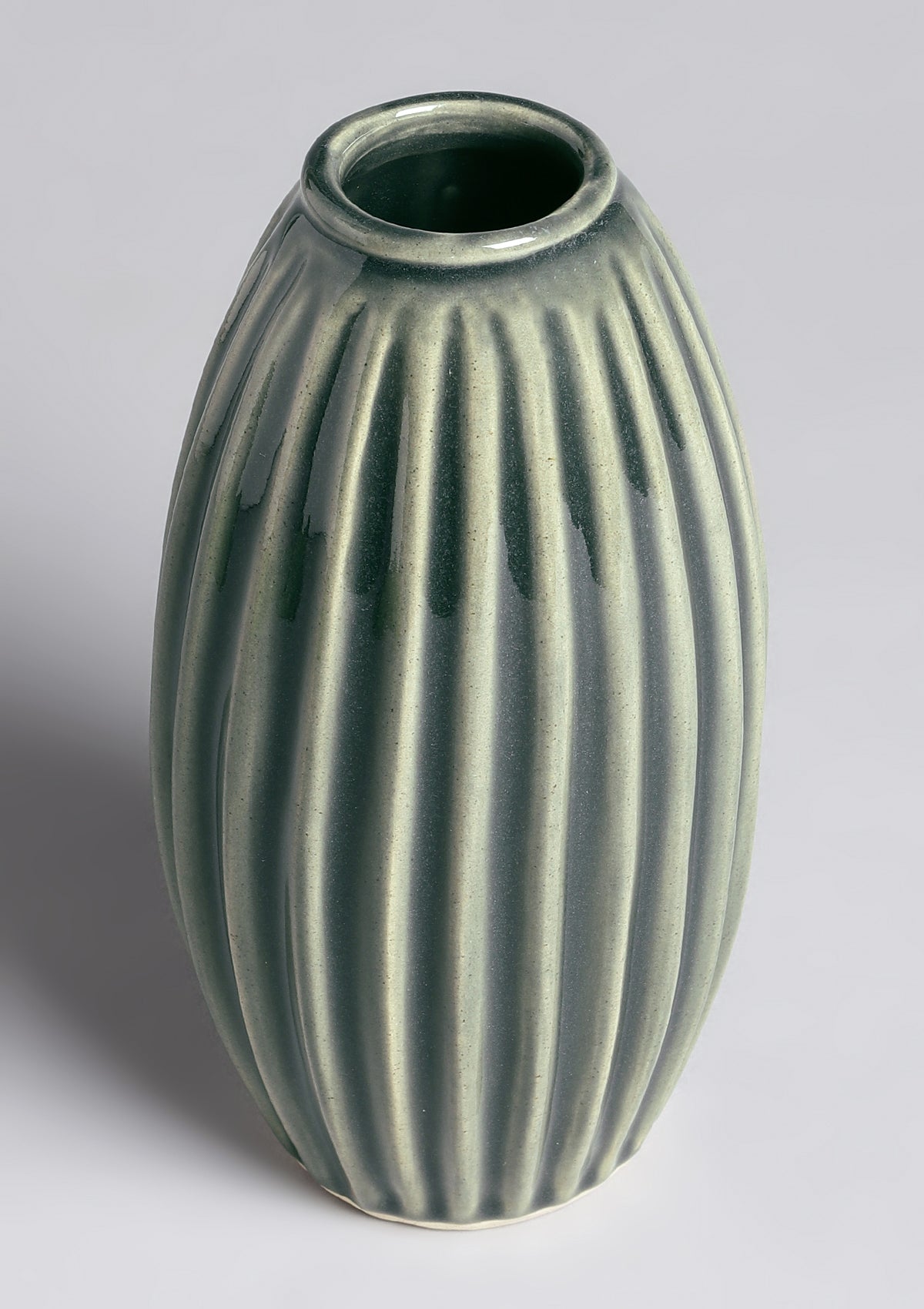 Grey green ceramic tableware with bouquet vase
