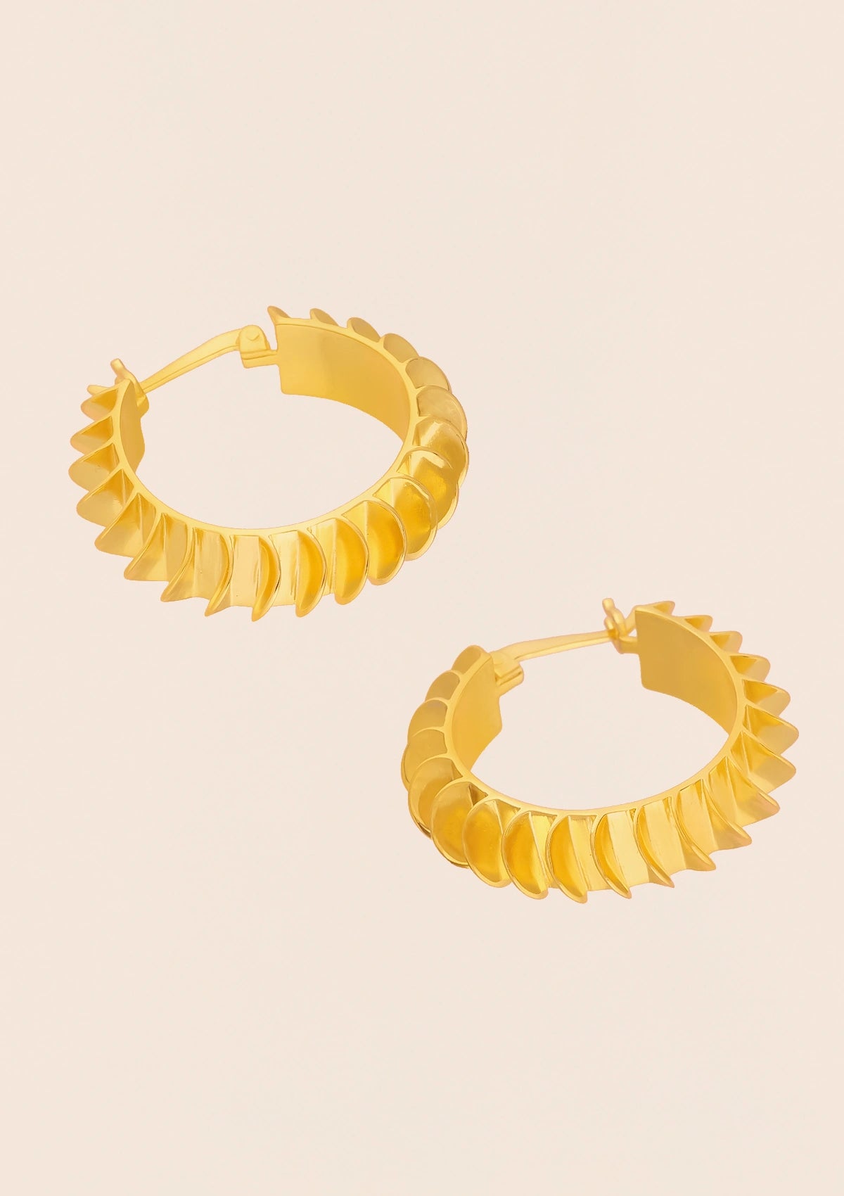 Designer sculpted wavy hoop earrings for women
