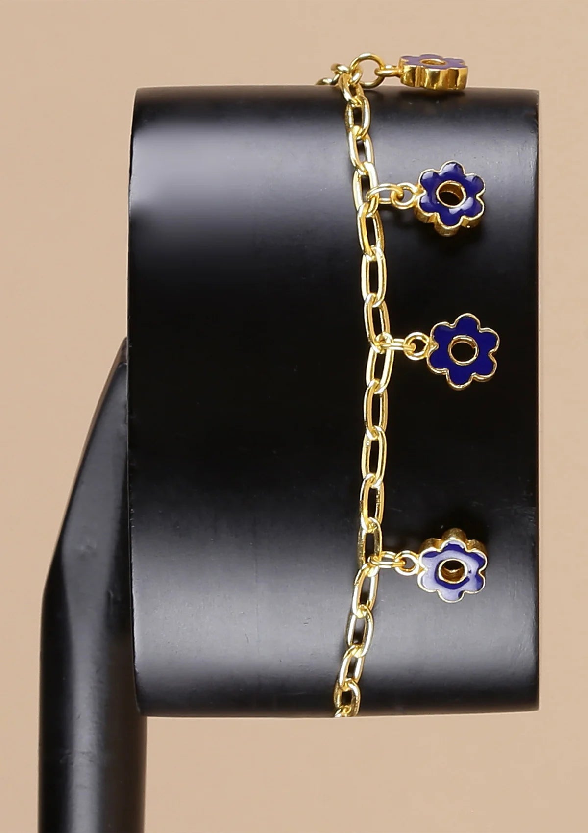 Gold plated blue flower charm jewellery bracelet for women online