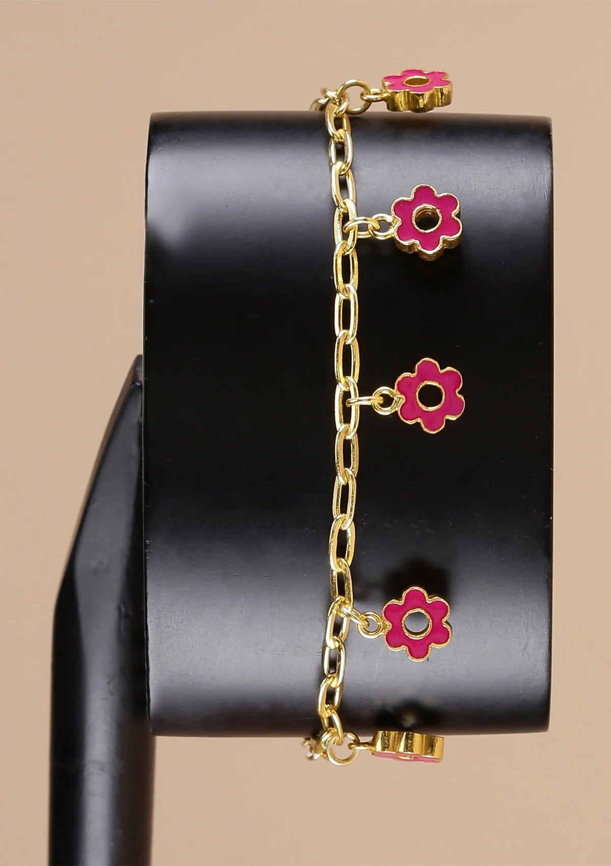 Buy Gold plated pink flower charm jewellery bracelet for women Online