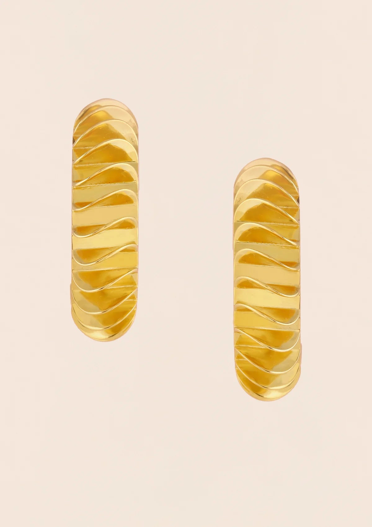 Statement sculpted wavy hoop earrings for women