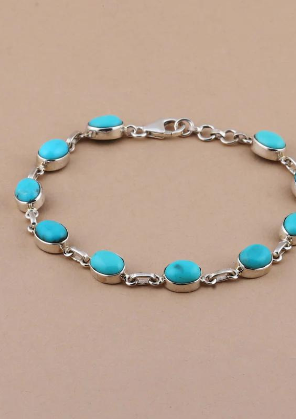 Silver Bracelet studded with Turquoise gemstones